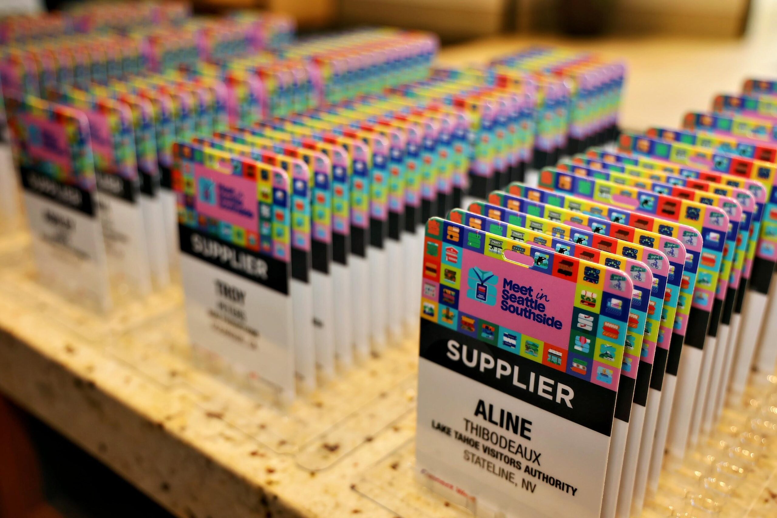 Allison holding camera as a professional headshots & event photography expert