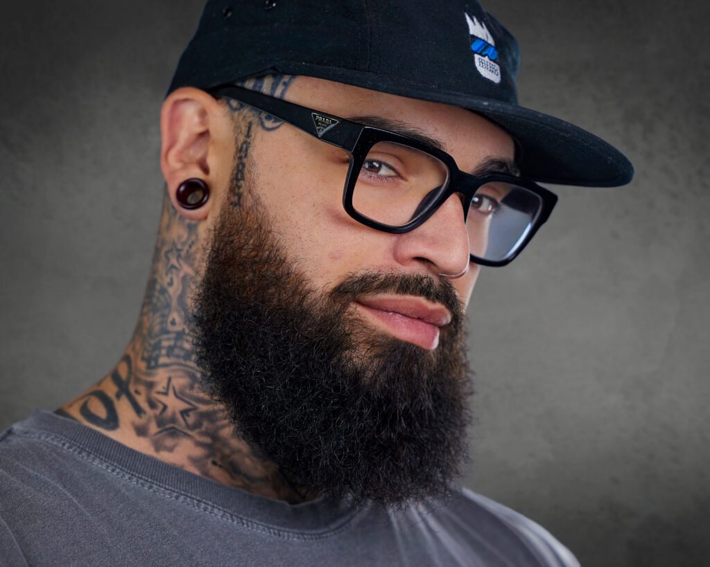 Actor Headshot showing musician with neck tatoos, CT
