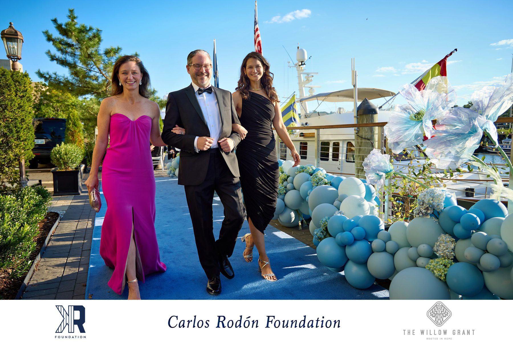 Allison holding camera as a professional headshots & event photography expert